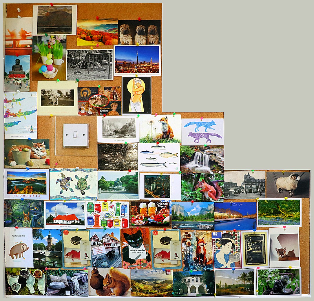 postcards on a pinboard