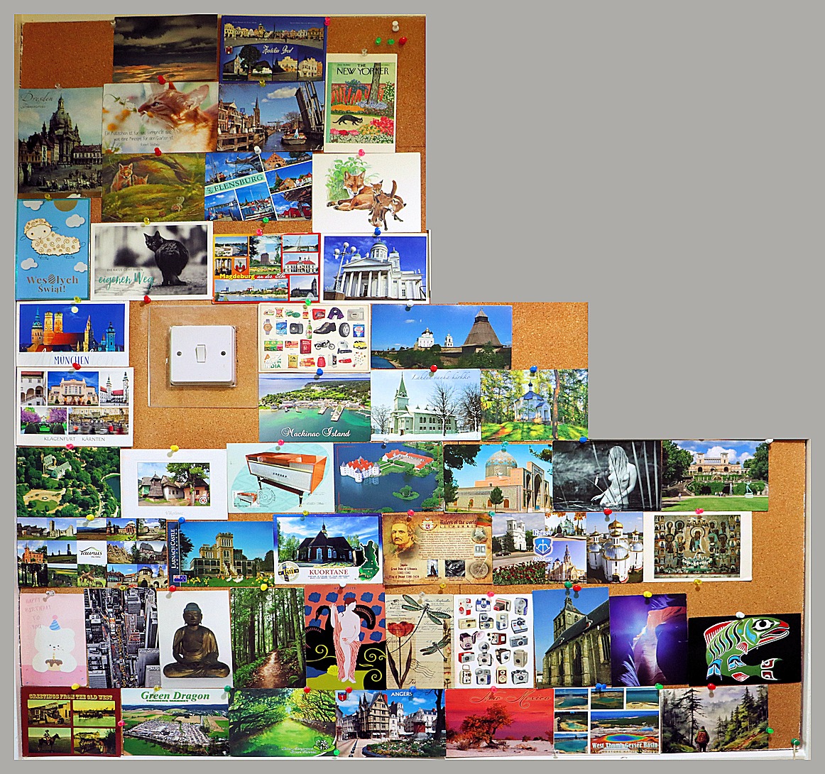 postcards on noticeboard
